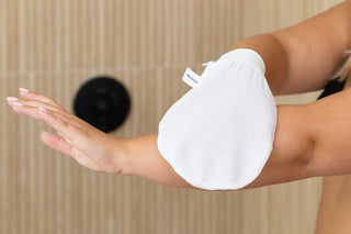 Wildpier Deep Exfoliating Glove being used on the arm